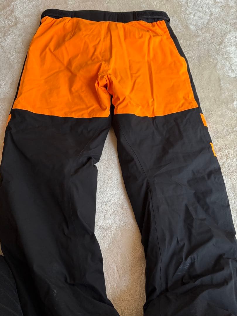 ROSSIGNOL スキーウェア 黒/オレンジ　上下セット