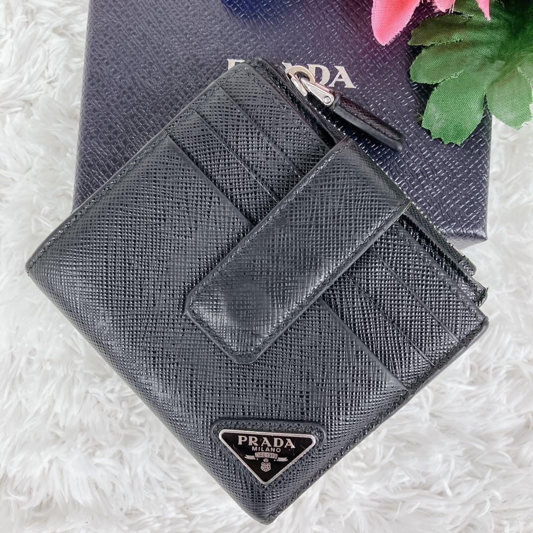 てぃくや プラダ 折り財布 サフィアーノ2MC066メタルロゴ 三角