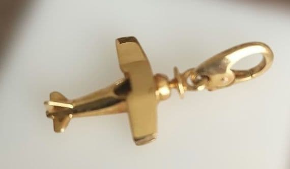 C*t様 Cartier カルチエ　ペンダントヘッド　18K 飛行機 保証書付き