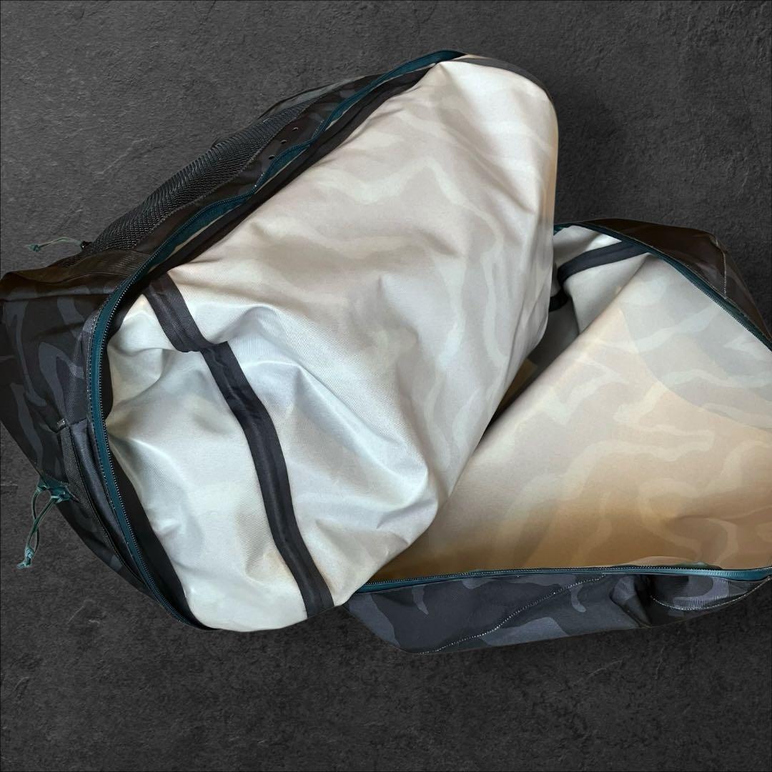 パタゴニアpatagoniaジェリーロペス プレーニングダッフルバッグ カモ