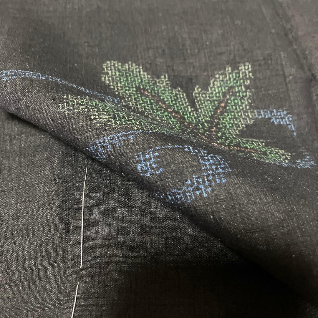 本場結城紬 重要無形文化財 地機 黒地 100亀甲 飛び柄 4色絣 未使用 美品