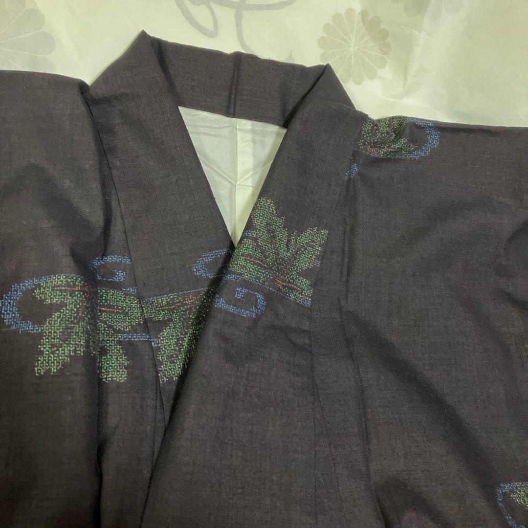 本場結城紬 重要無形文化財 地機 黒地 100亀甲 飛び柄 4色絣 未使用 美品