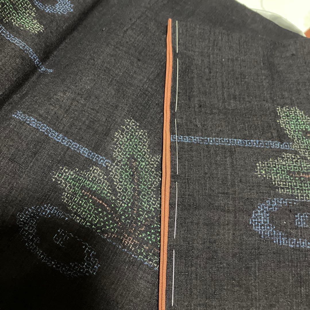 本場結城紬 重要無形文化財 地機 黒地 100亀甲 飛び柄 4色絣 未使用 美品