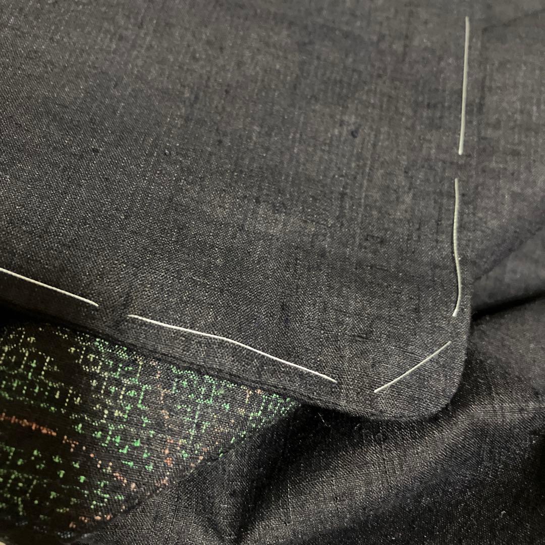 本場結城紬 重要無形文化財 地機 黒地 100亀甲 飛び柄 4色絣 未使用 美品