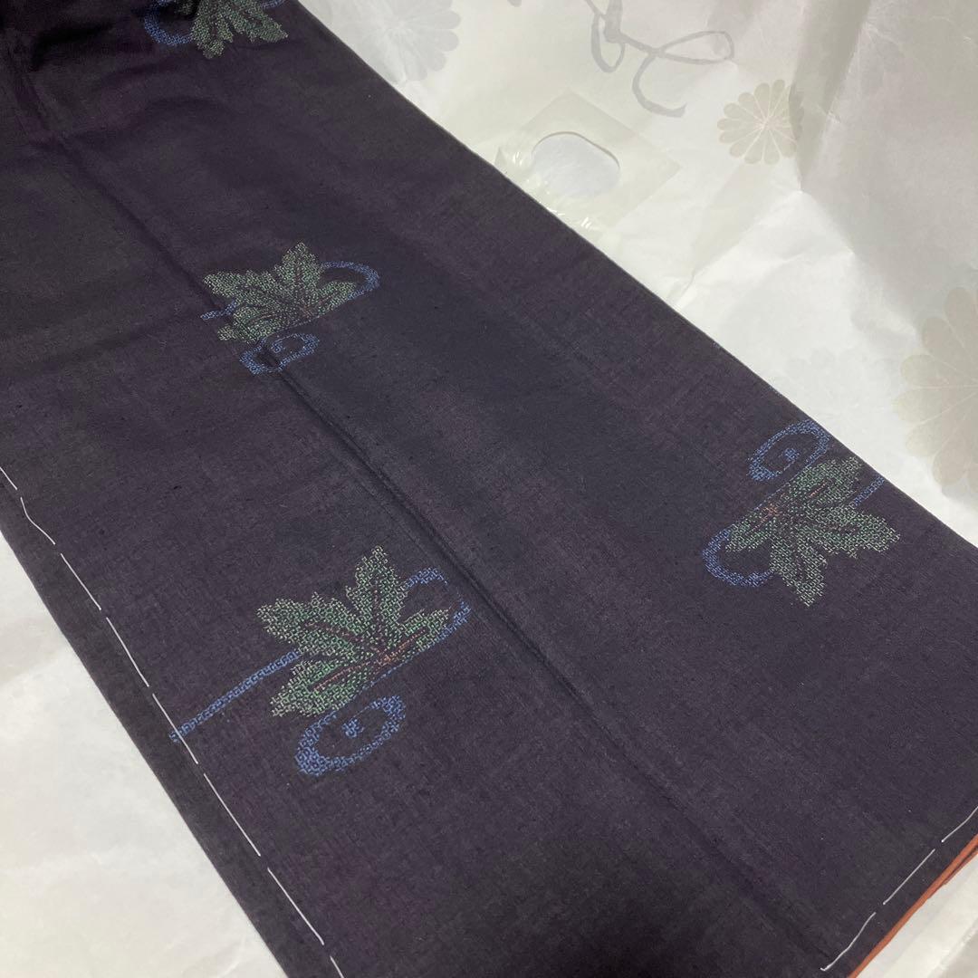 本場結城紬 重要無形文化財 地機 黒地 100亀甲 飛び柄 4色絣 未使用 美品