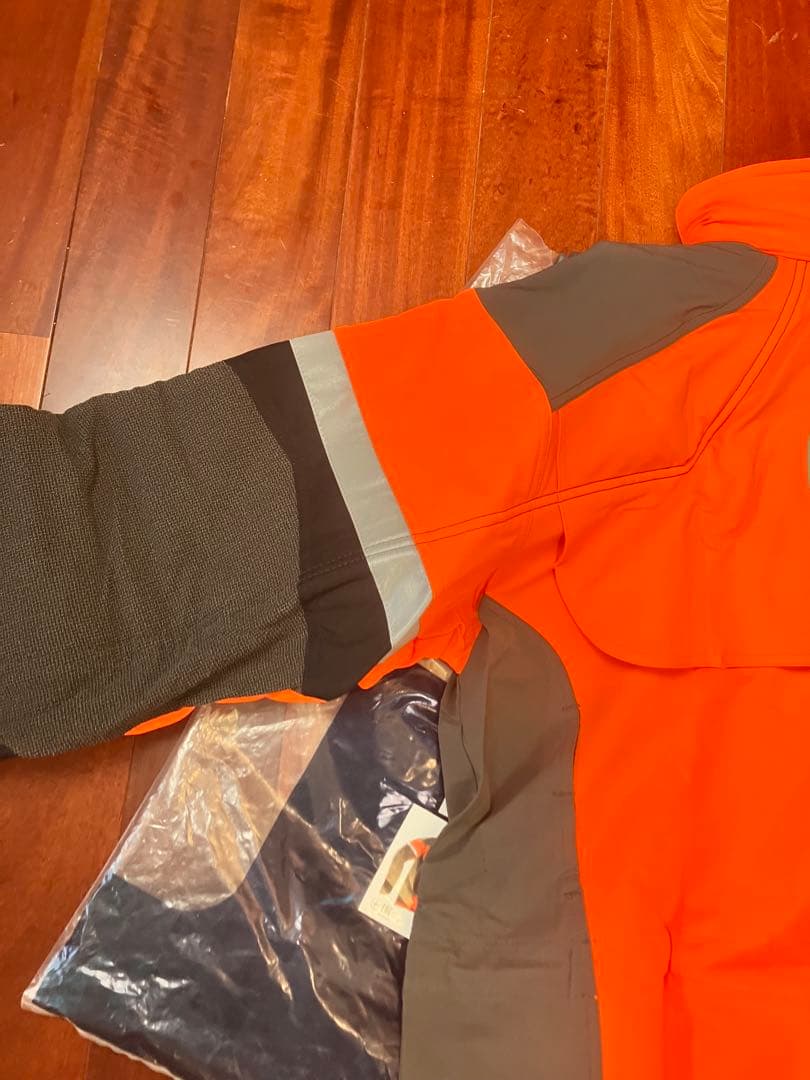 新品　Husqvarna テクニカルジャケットLサイズ オレンジ　おまけ付き