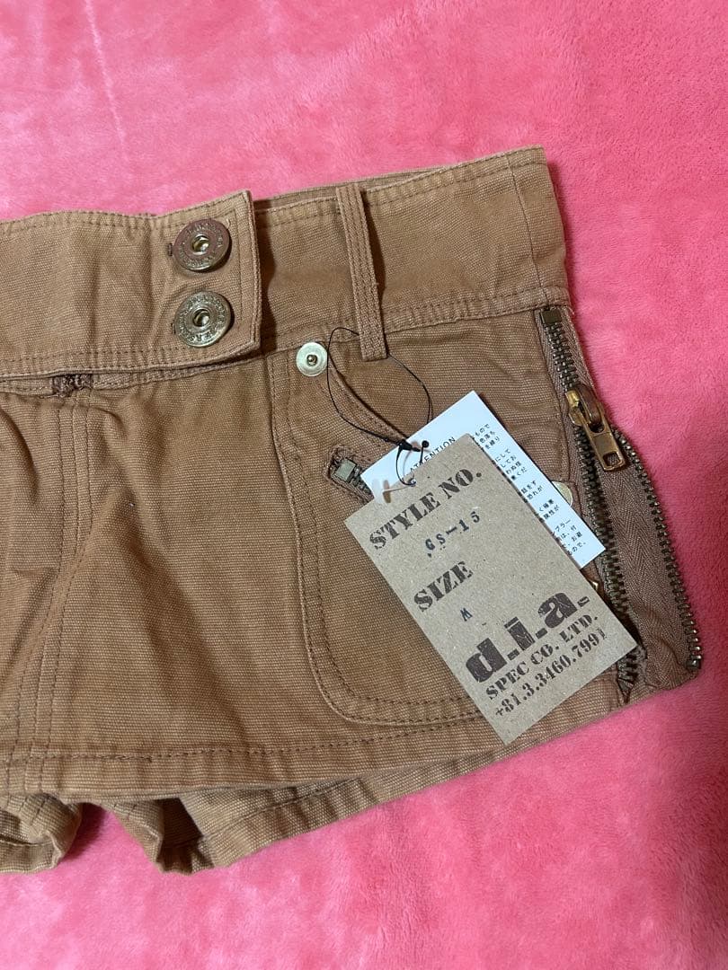 メ*グ様 d.i.a.サイドジッパー脚見せ 幅広ウエストダブルボタンマイクロミニ