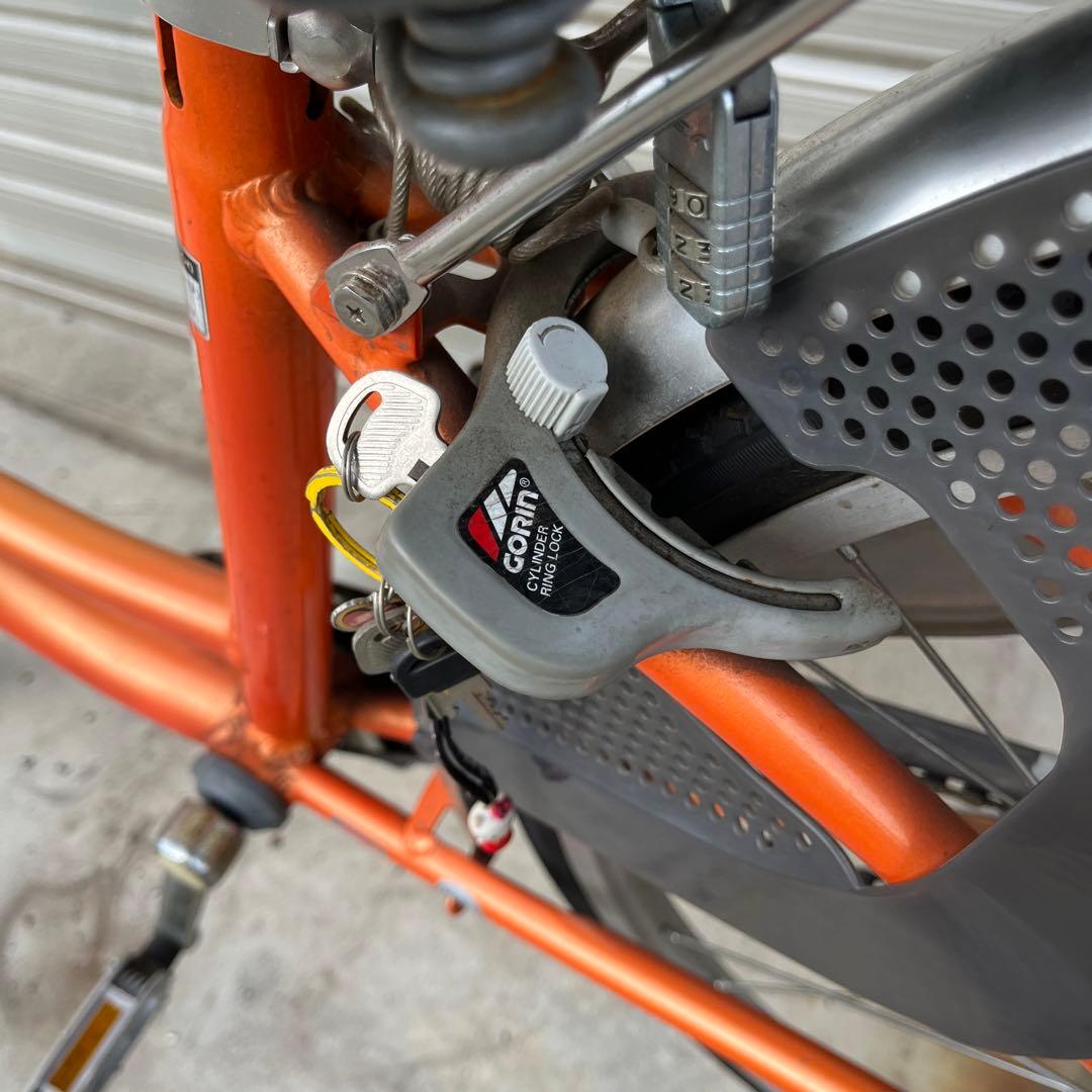 26インチオレンジ シティサイクル 前バスケット付き
