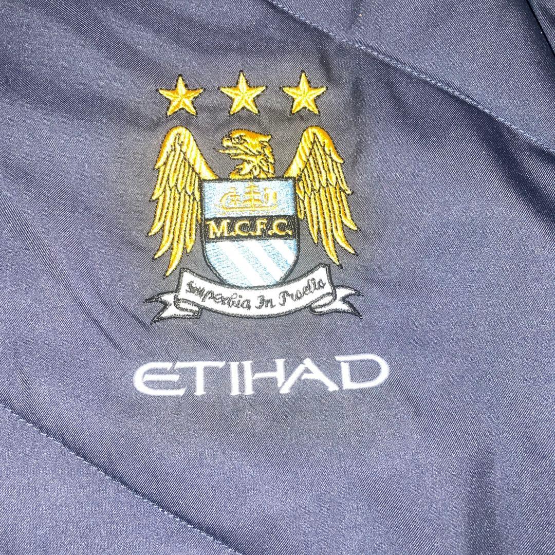 アンブロ マンチェスターシティー ナイロンジャケット XL グレー　セットアップ