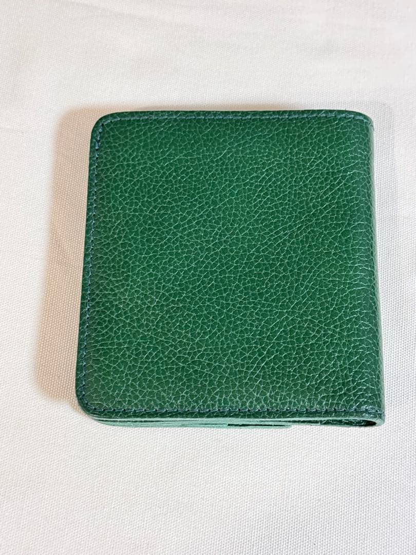 イルビゾンテ　グリーンレザー二つ折り財布 保存袋　オルゴール付き