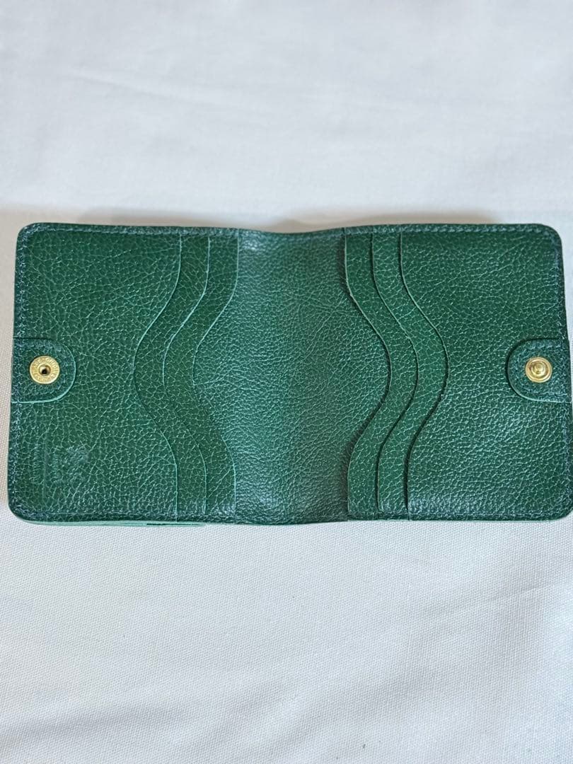 イルビゾンテ　グリーンレザー二つ折り財布 保存袋　オルゴール付き