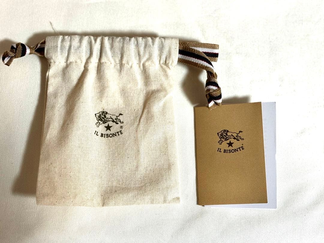 イルビゾンテ　グリーンレザー二つ折り財布 保存袋　オルゴール付き