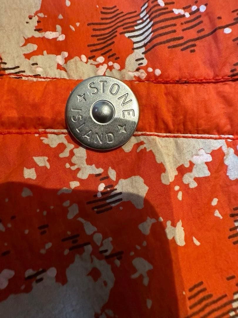 ストーンアイランド シャドウプロジェクト ベスト オレンジ 総柄