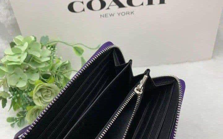 新品未使用コーチ長財布パープルシグネチャーレディースメンズ送料無料即日発送