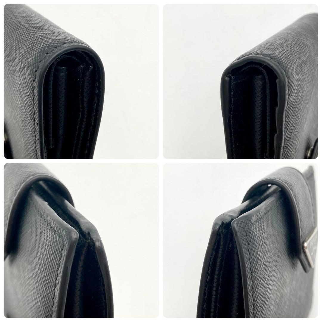 チェリ♡*⇝✨ PRADA サフィアーノタブ 二つ折り財布 黒 三角ロゴ