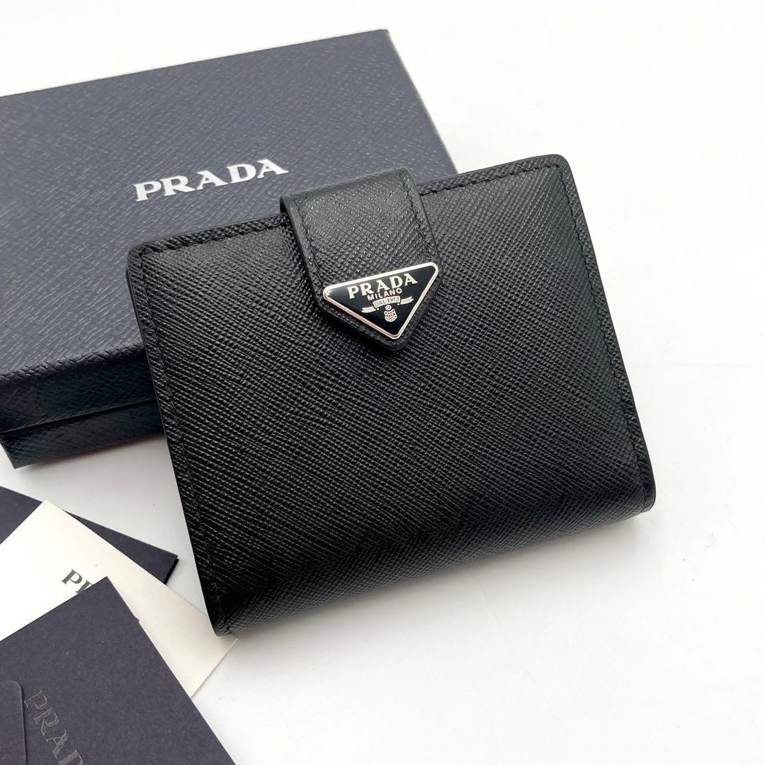チェリ♡*⇝✨ PRADA サフィアーノタブ 二つ折り財布 黒 三角ロゴ