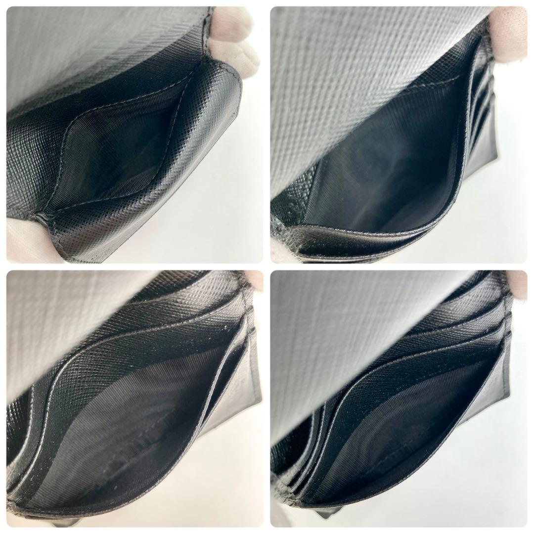 チェリ♡*⇝✨ PRADA サフィアーノタブ 二つ折り財布 黒 三角ロゴ