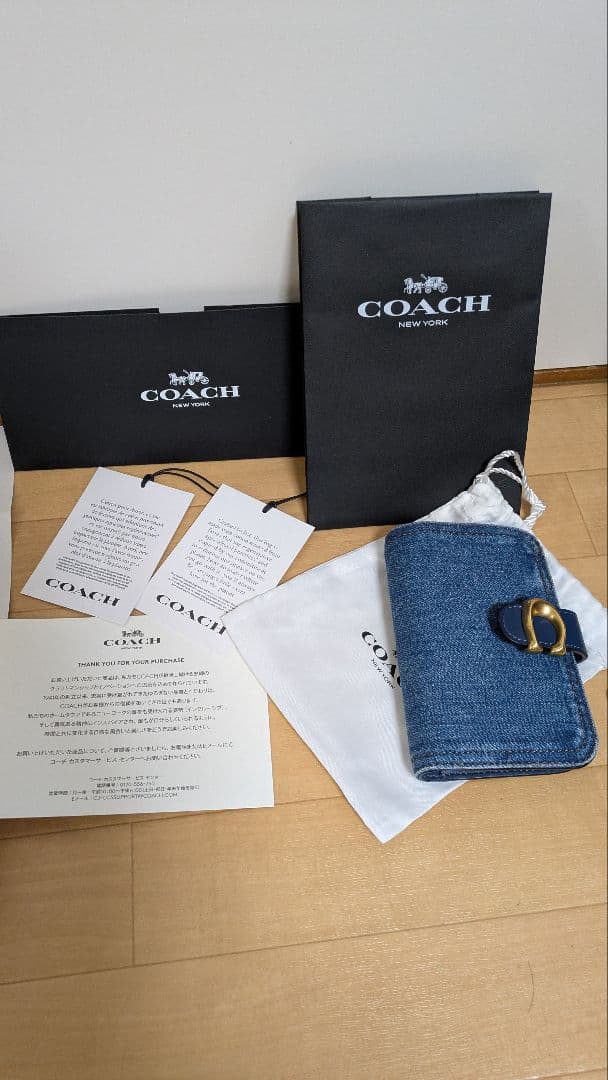 コーチ２つ折り財布タビー