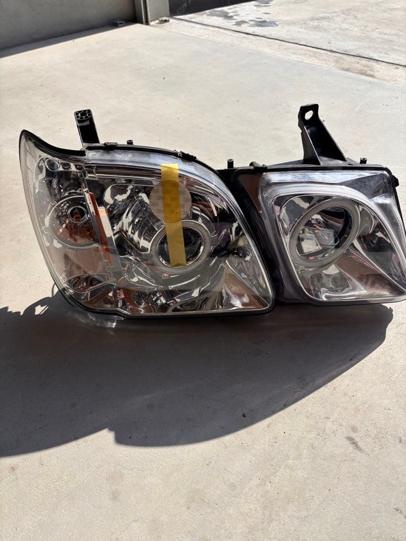 ランドクルーザーシグナス　ヘッドライトEARGLE EYE LX470