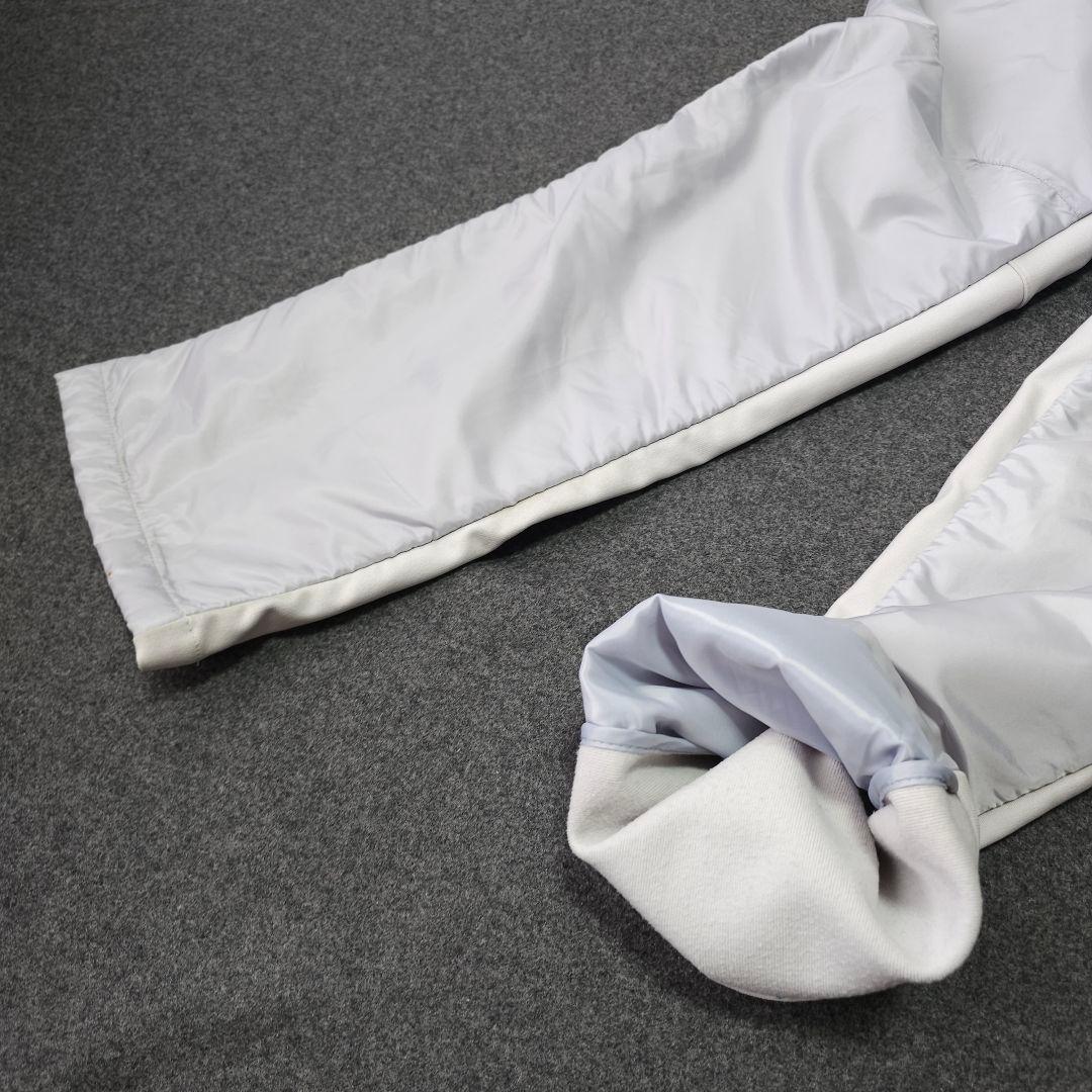 美品 アンパスィ ダンボールニット 中綿ストレッチゴルフパンツ LL