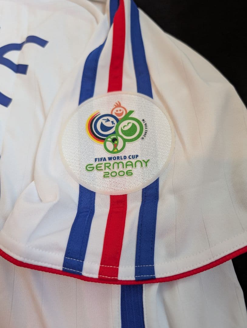 【新品タグ付き】フランス代表/ジネディーヌ・ジダン/A/2006W杯頭突きモデル