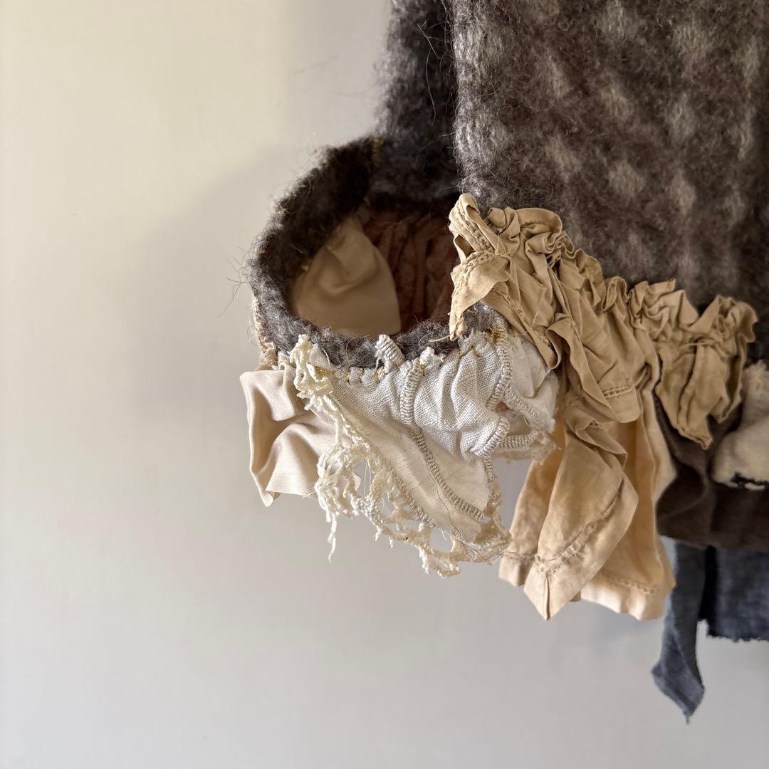 aratama アラタマさんのチェック柄ニットフリルベスト