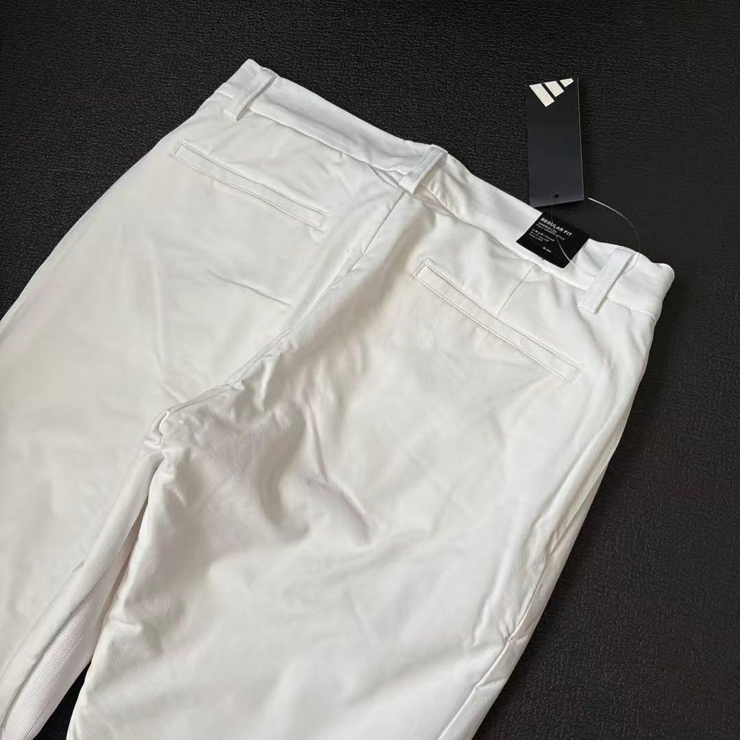 85新品27500円アディダスゴルフ/メンズ/秋冬/中綿ストレッチパンツ/
