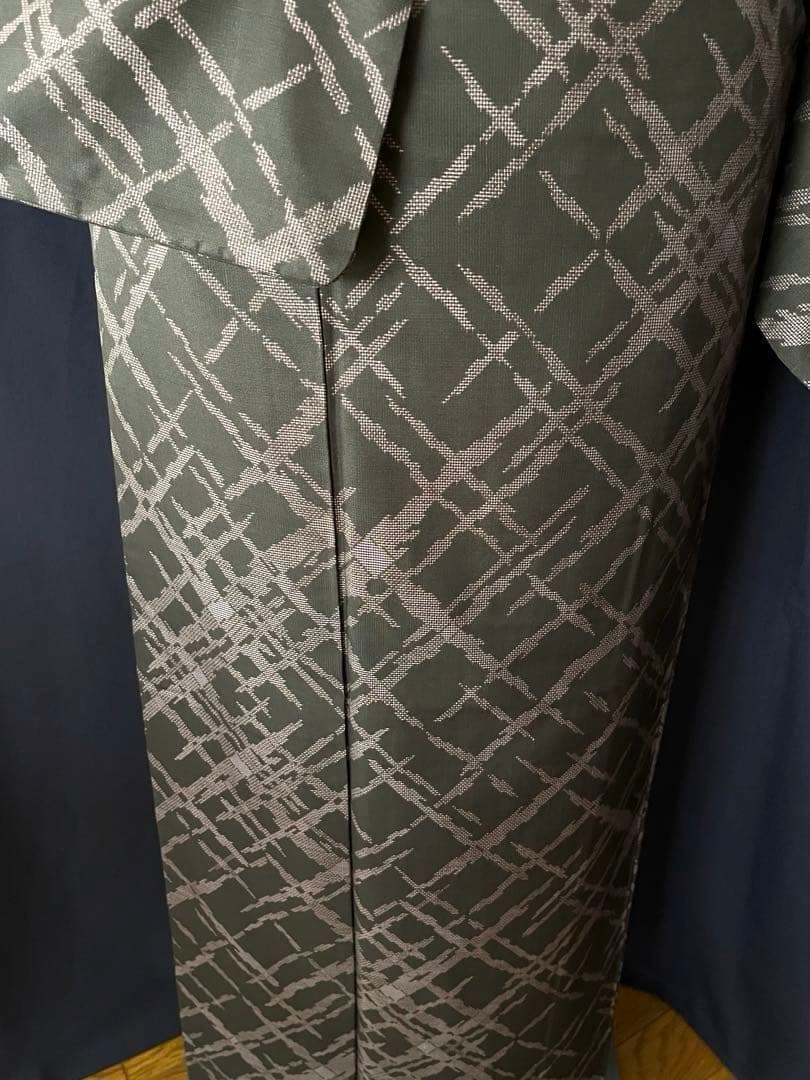 【本場大島紬・名古屋帯セット】　スタイリッシュ　 本泥染め9マルキ　吉祥文