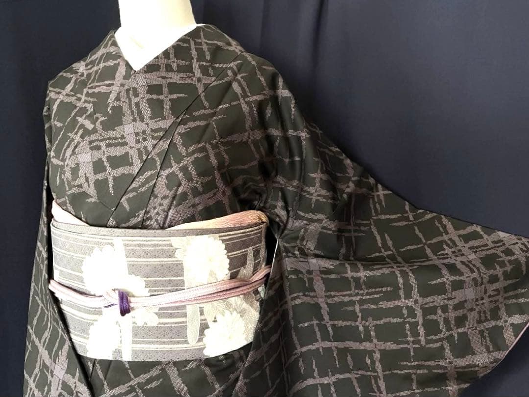 【本場大島紬・名古屋帯セット】　スタイリッシュ　 本泥染め9マルキ　吉祥文