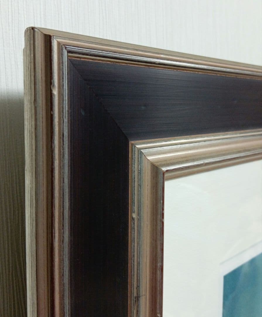 ダリ リンカーンの肖像に変容する地中海を見つめるガラ