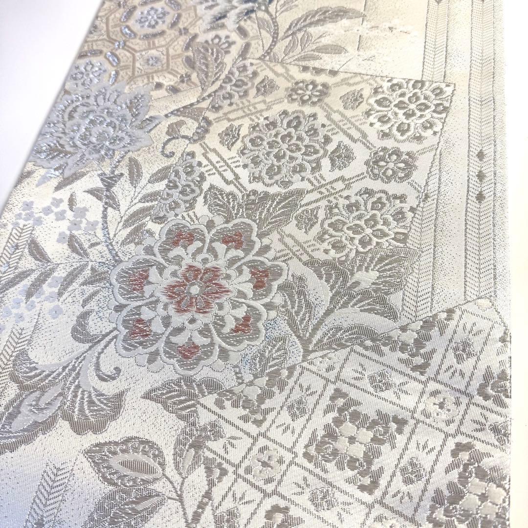 5k2480 袋帯　絹　唐織　正倉院文様　華文　白　銀色　ピンク　青　花柄　和装