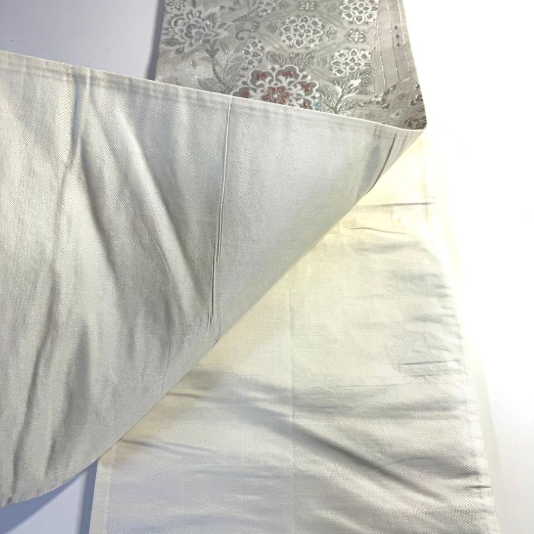 5k2480 袋帯　絹　唐織　正倉院文様　華文　白　銀色　ピンク　青　花柄　和装