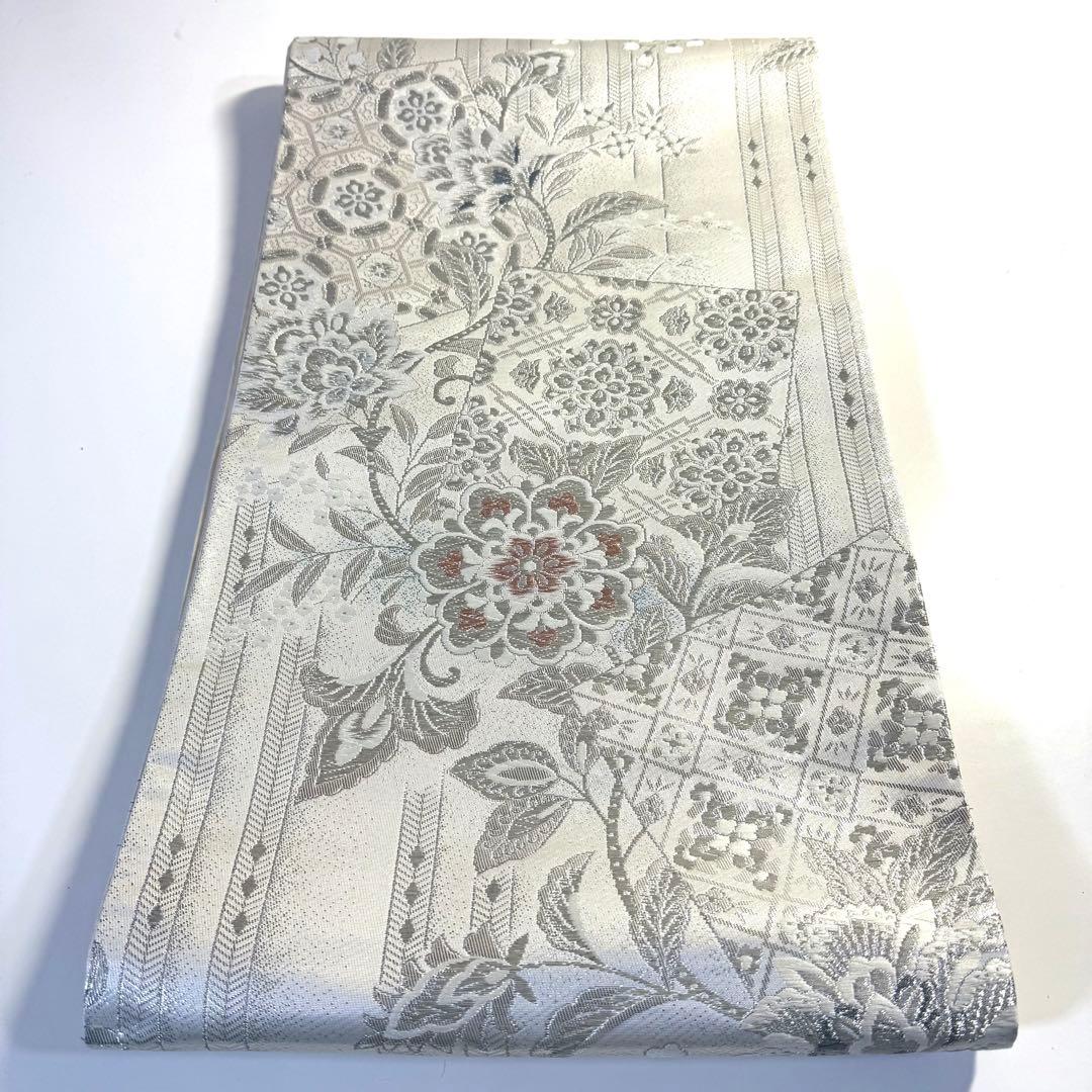5k2480 袋帯　絹　唐織　正倉院文様　華文　白　銀色　ピンク　青　花柄　和装