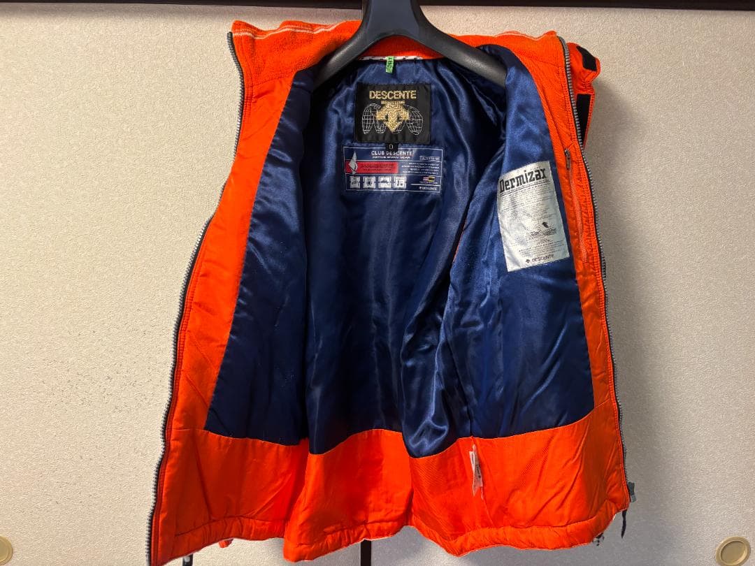 DESCENTEデサント スキースノーボードウェア オレンジ/ネイビー サイズO