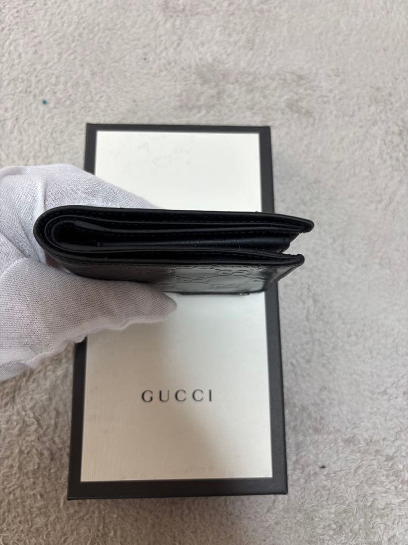 y*1様 GUCCI ブラックレザー 二つ折り財布