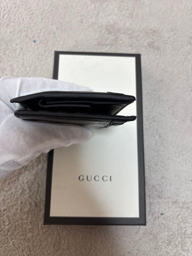 y*1様 GUCCI ブラックレザー 二つ折り財布