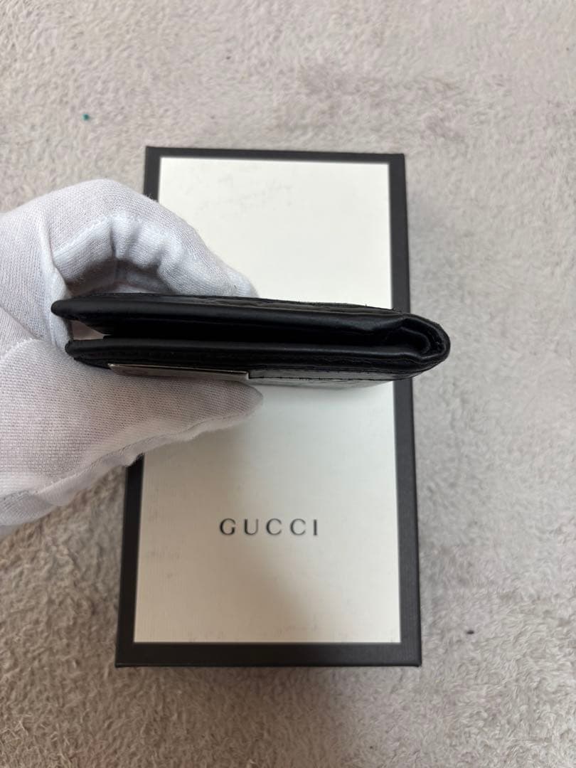 y*1様 GUCCI ブラックレザー 二つ折り財布