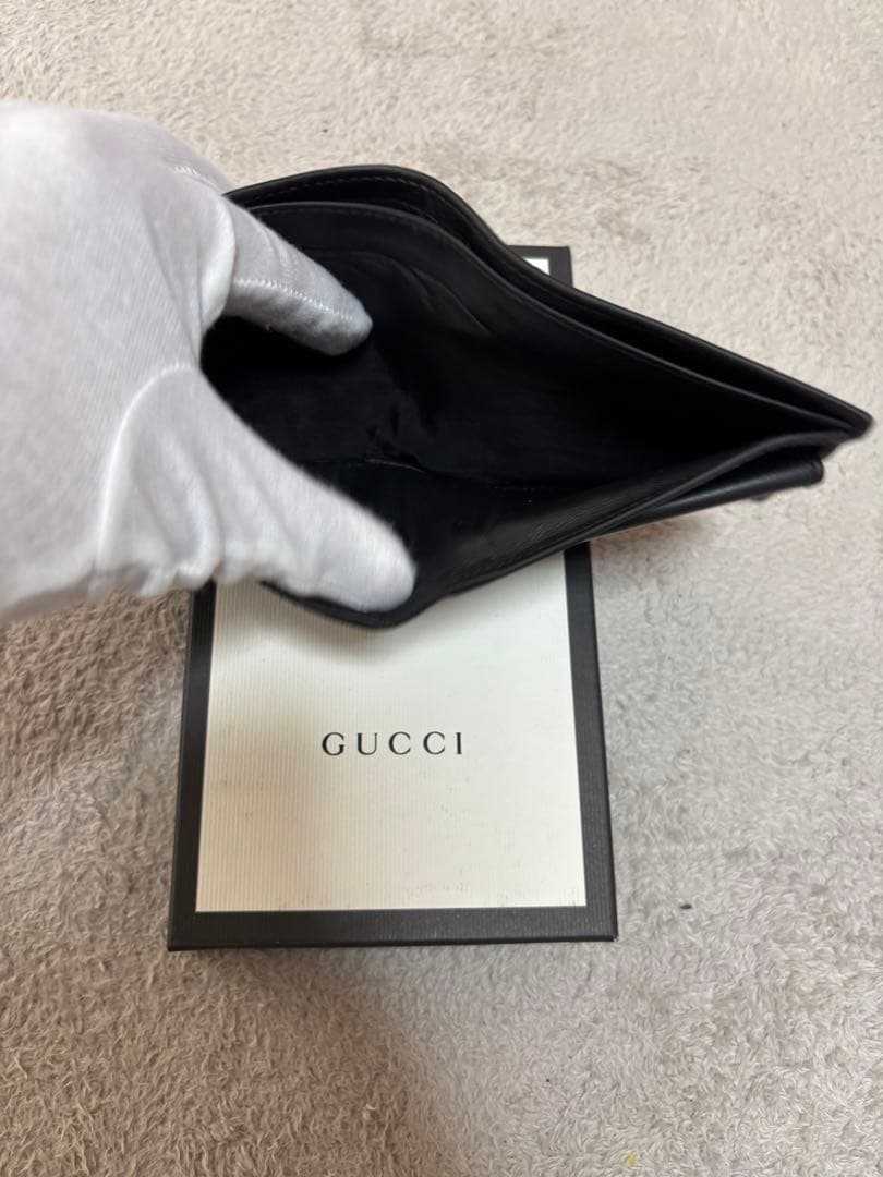 y*1様 GUCCI ブラックレザー 二つ折り財布