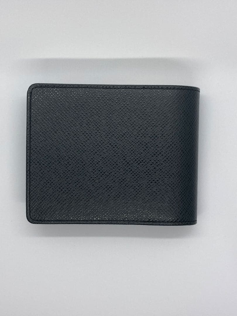 現行　未使用保管　ルイヴィトン　タイガ　アメリゴNM　二つ折り財布