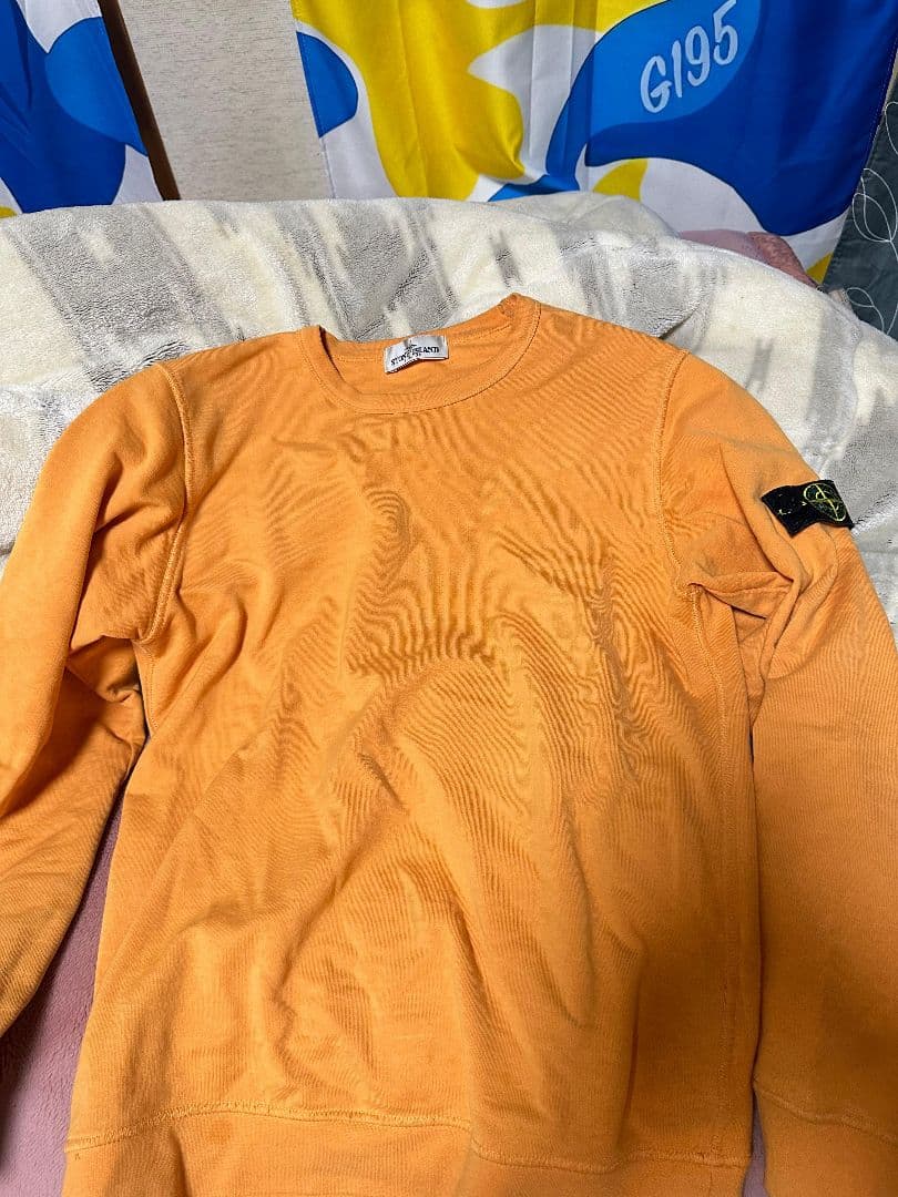 Stone  オレンジ トレーナー
