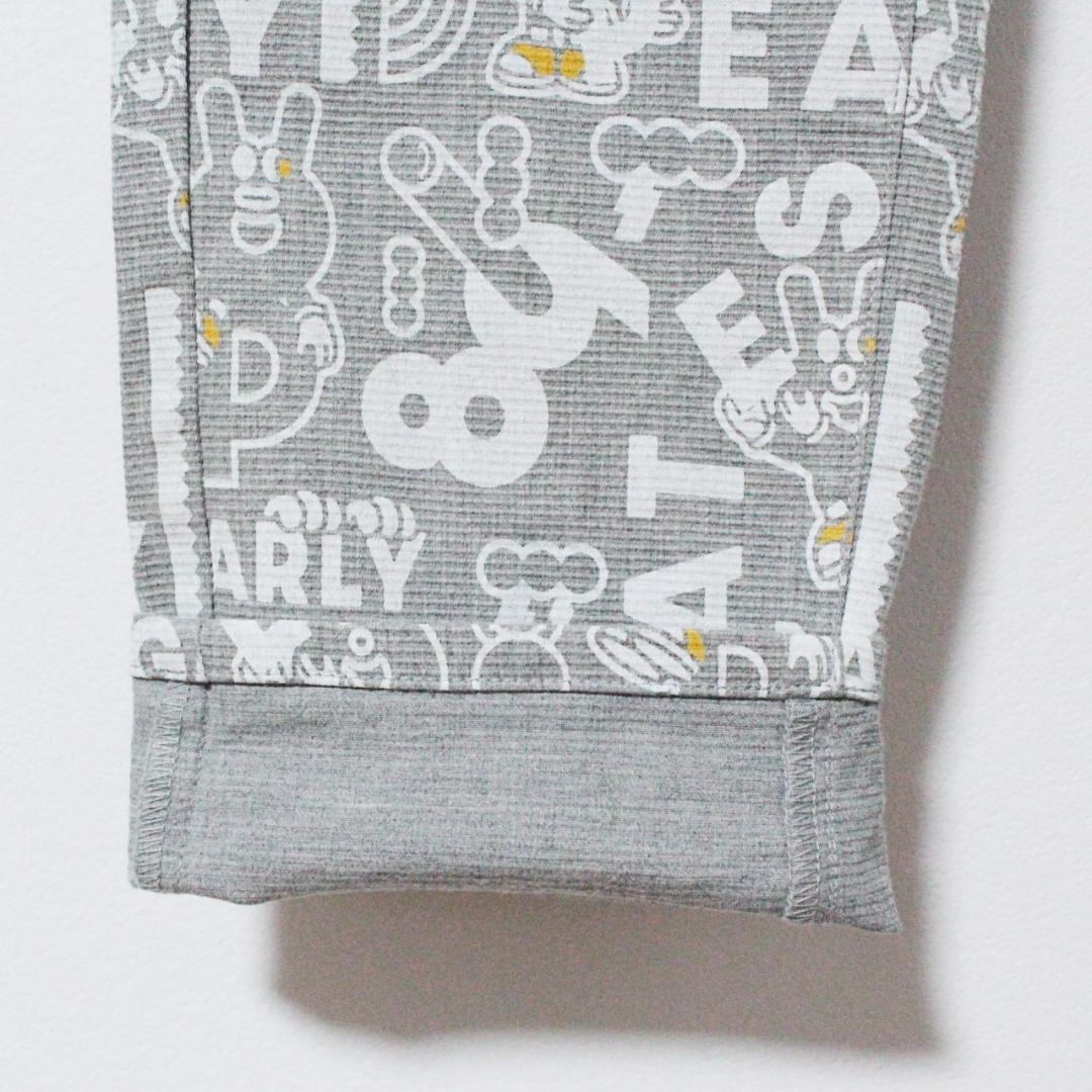 新品 パーリーゲイツ PGキャラクター総柄 ストレッチロングパンツ M（W72）