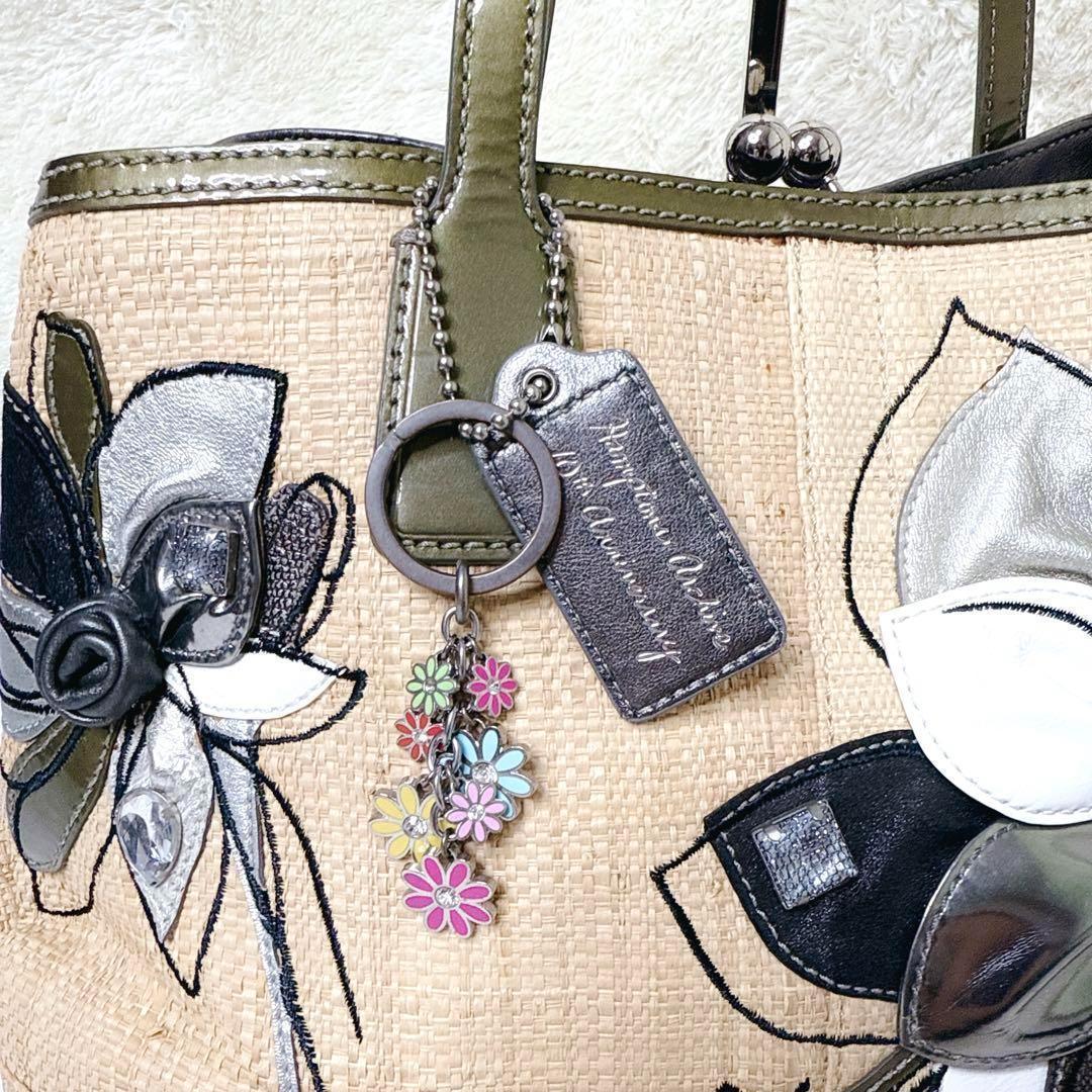 バッグ COACH Hamptons Flower Straw Kisslock Bag