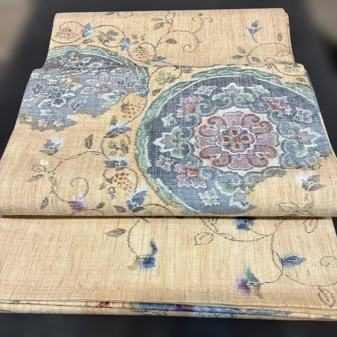 袋帯 紬地 華文 花唐草 ベージュ 六通 正絹