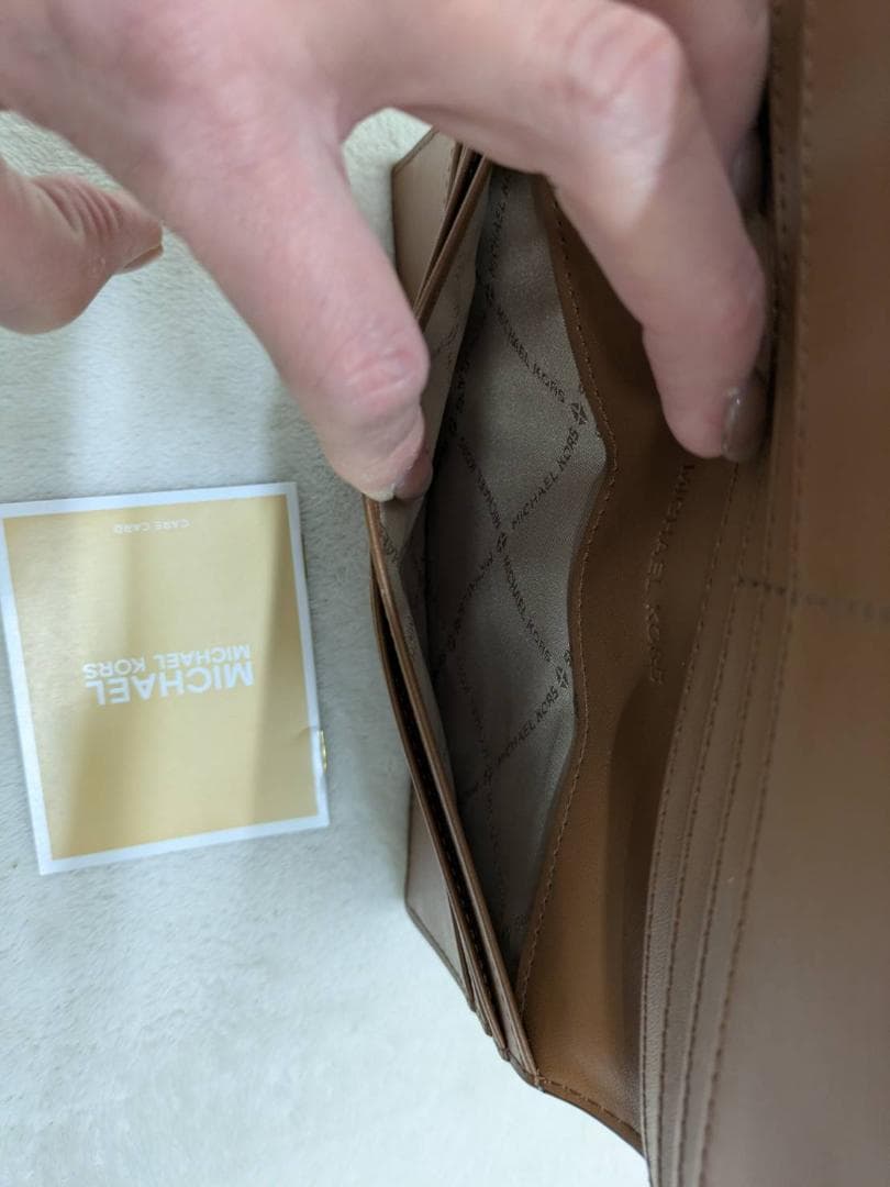 【新品未使用】マイケルコース CARSON　ロゴ デボス 長財布
