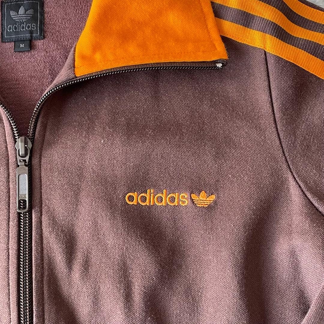 adidas 黒タグ トラックジャケット ブラウン×オレンジ 刺繍ロゴ 万国旗
