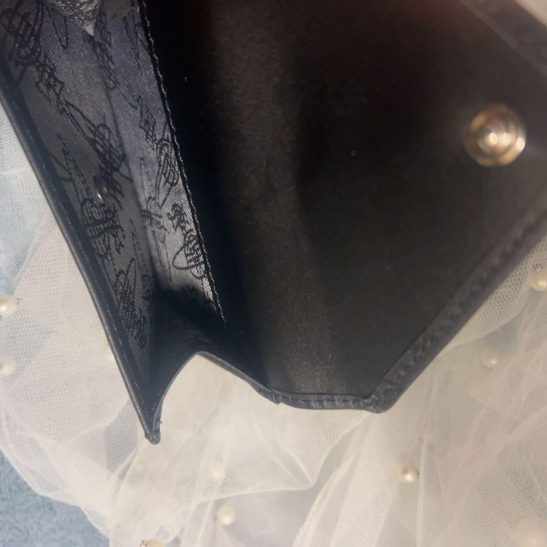 VivienneWestwood黒いエンボス三つ折り財布