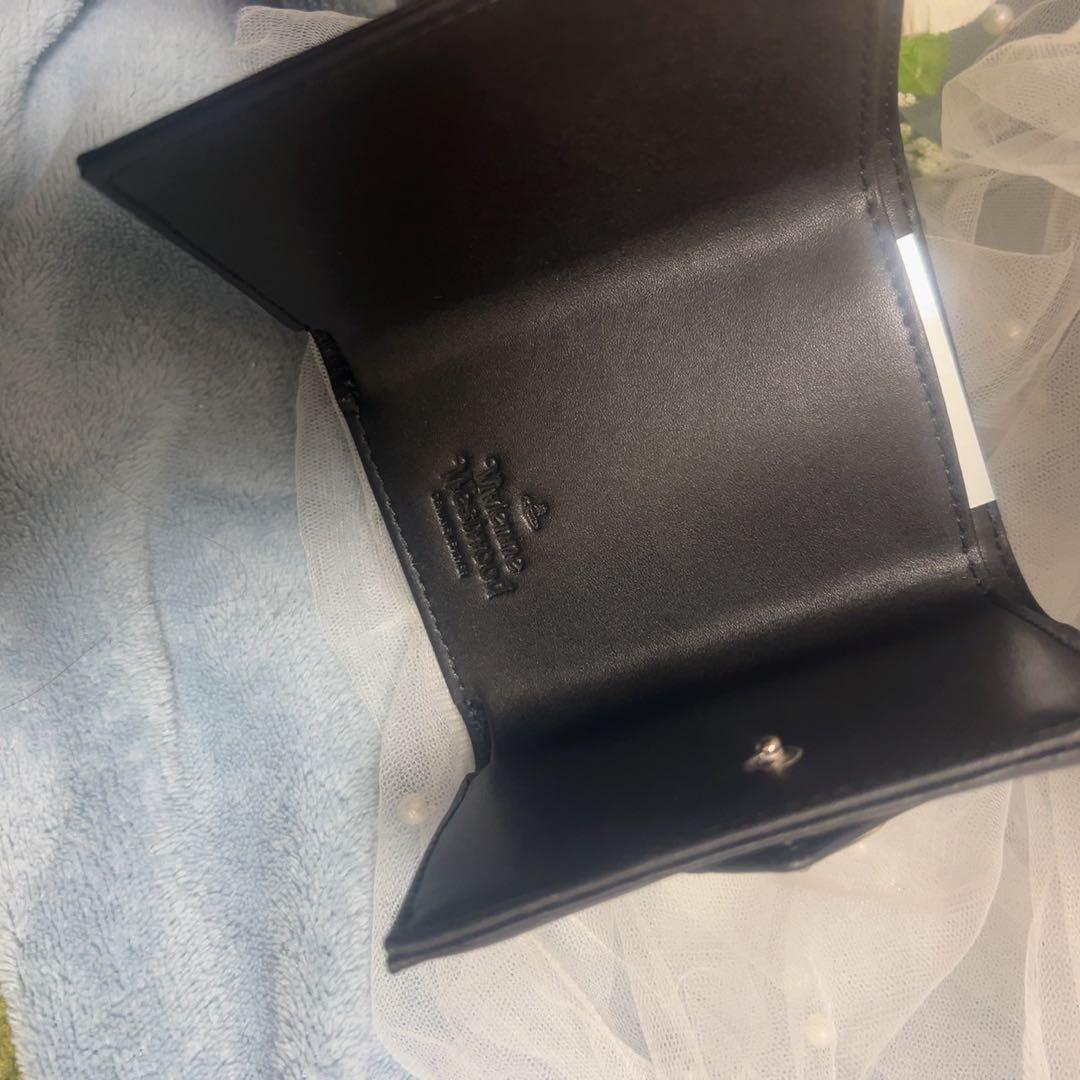 VivienneWestwood黒いエンボス三つ折り財布