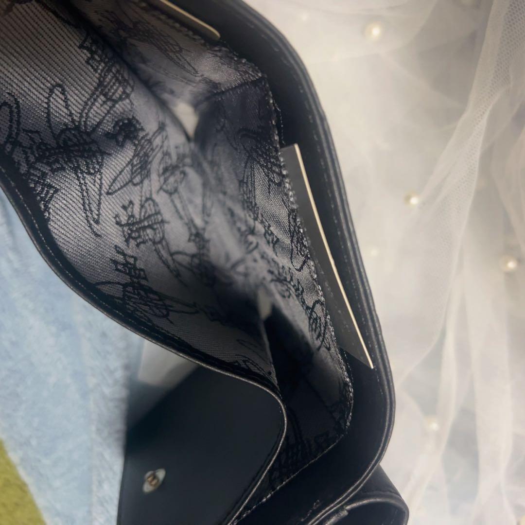 VivienneWestwood黒いエンボス三つ折り財布
