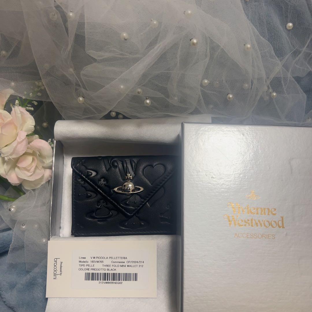 VivienneWestwood黒いエンボス三つ折り財布