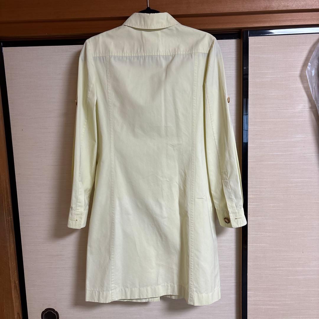 エルメス淡い黄色のトレンチコート